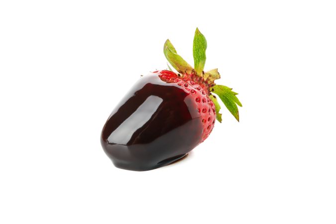 Chocolate fondue. Strawberry in chocolate sauce isolated on blank background