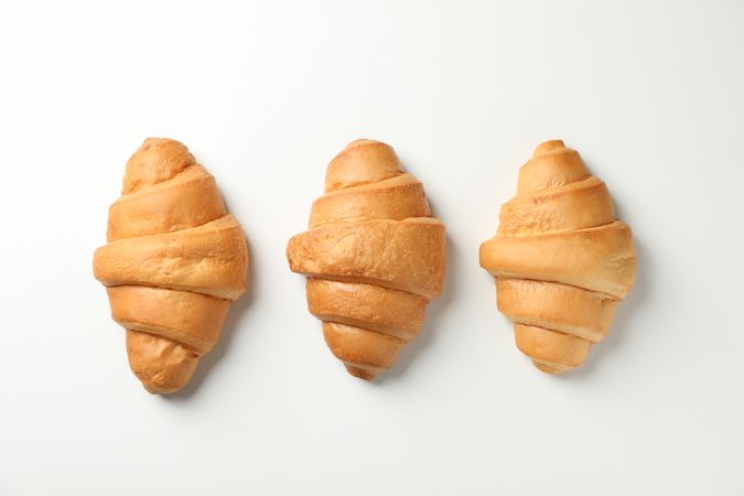 Top view of row of three croissants