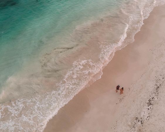 Aerial view of two people on beach