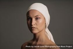 White woman with a scarf wrapped on her head 4jKz8b