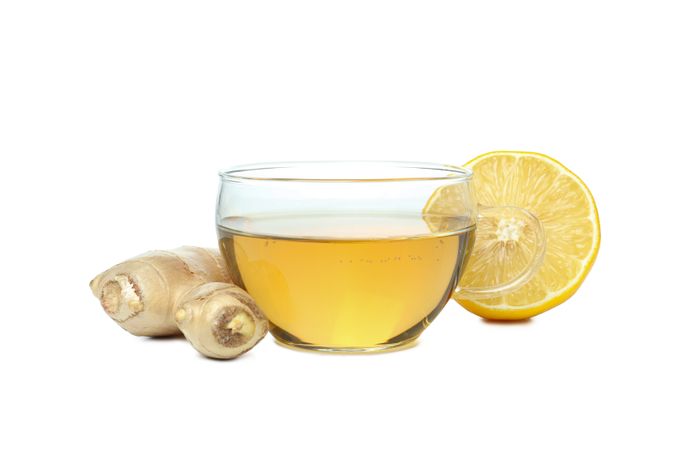 Cup of tea, lemon and ginger, isolated on plain background