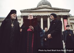 London, England, United Kingdom - March 5 2022: Three men in religious garbs speaking at protest 5nnd85