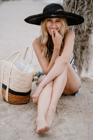 Young female relaxing on beach