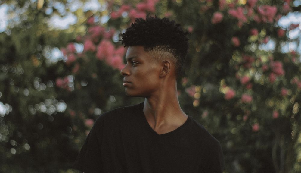 Young man looking sideway outdoor