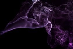 Colorful smoke on dark background