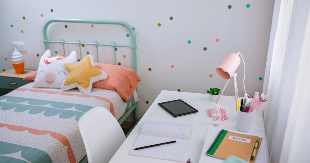 Girl's bedroom decorated in pastel colors