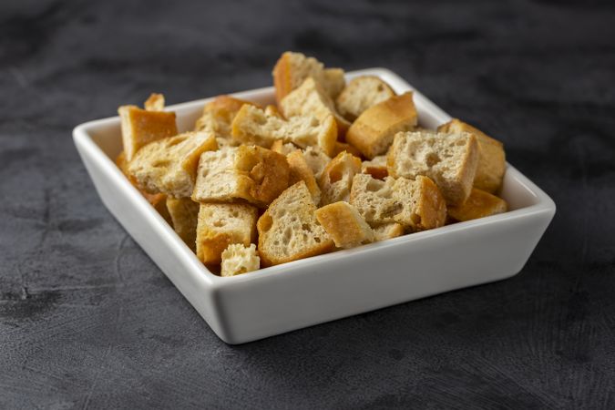Delicious crunchy croutons on the table.