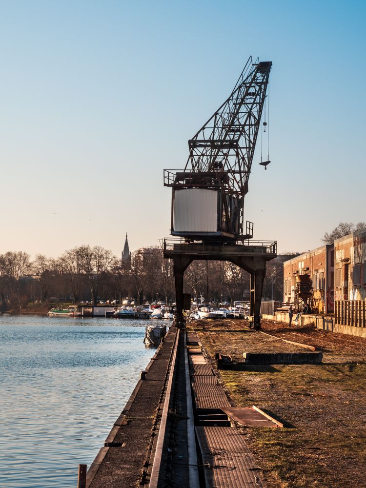 Old port, abandoned buildings, bridges, graffiti on the walls of houses in Strasbourg