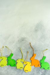 Easter holiday concept with colorful flat rabbit decorations