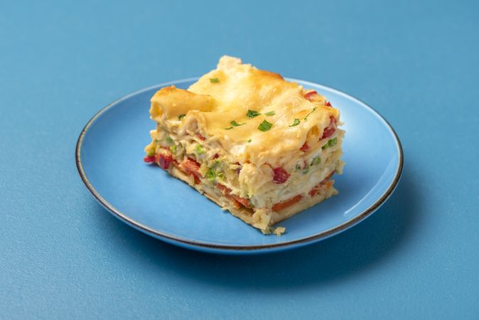 Vegetarian lasagna on a blue plate