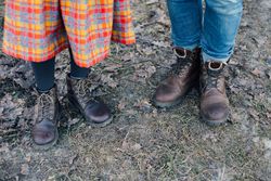 Two people wearing leather boots