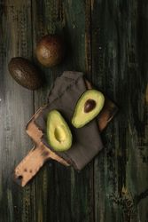 Set of freshly cut fresh avocados