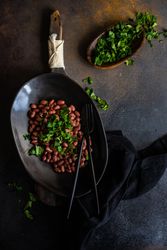 Top view of traditional Georgian lobio dish in elegant modern bowl with cilantro