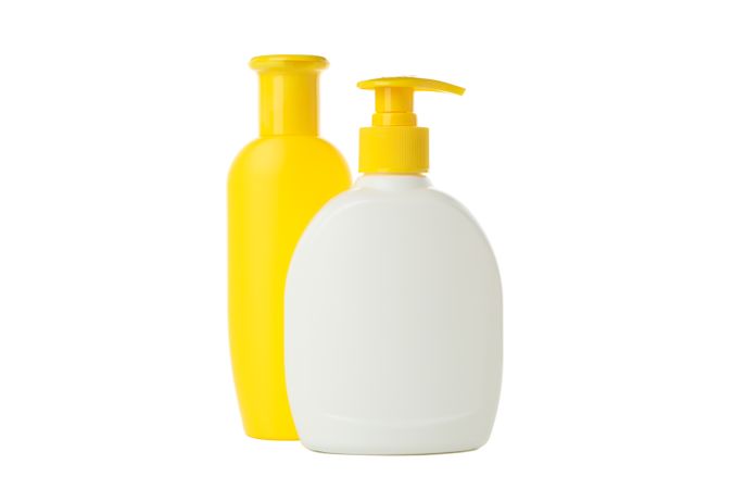 Blank bathroom bottles isolated on light background. Bathroom accessories
