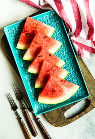 Top view of food concept with watermelon sliced on plate