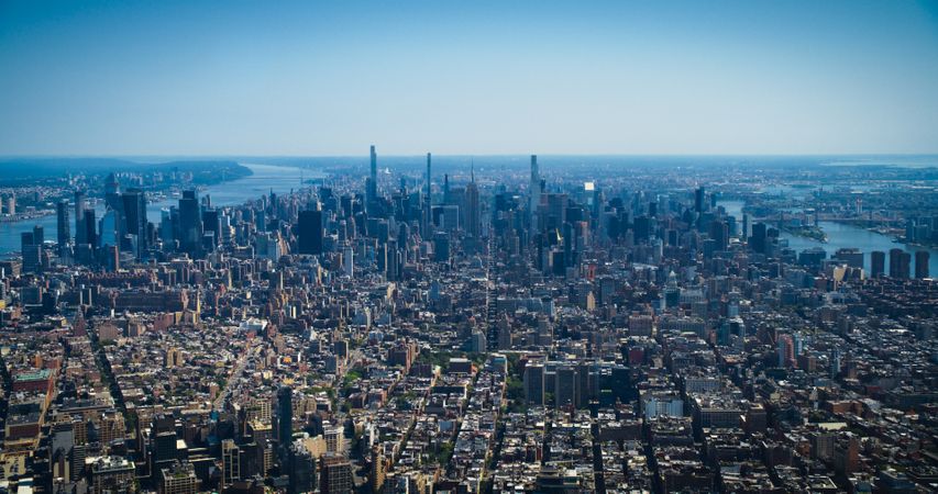 Scenic Aerial New York City View Towards Lower Manhattan Architecture. Panoramic Shot of Midtown Financial District from a Helicopter. Cityscape with Office Buildings and Skyscrapers