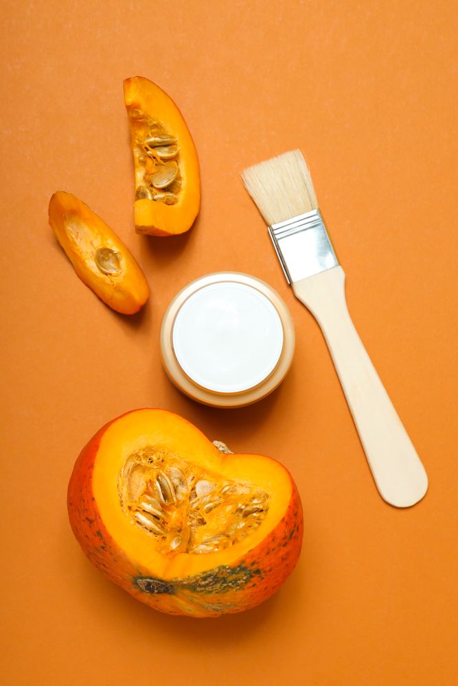 Concept of different cosmetic products, Pumpkin cosmetics, top view