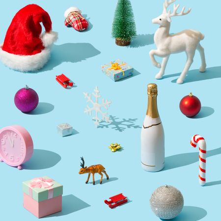 Scattered Christmas items on blue background
