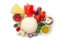 Dough and ingredients for cooking pizza isolated on blank background