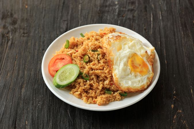 Nasi Goreng, Indonesian Fried Rice with Garlic, Shallots, and Soy Sauce.