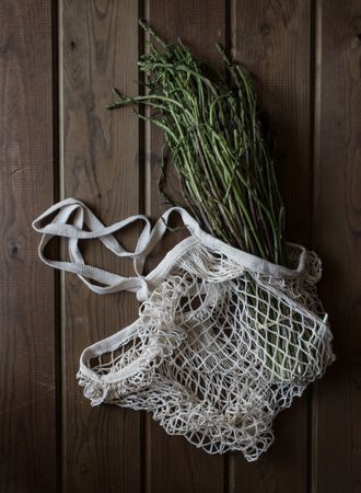 string bag with asparagus