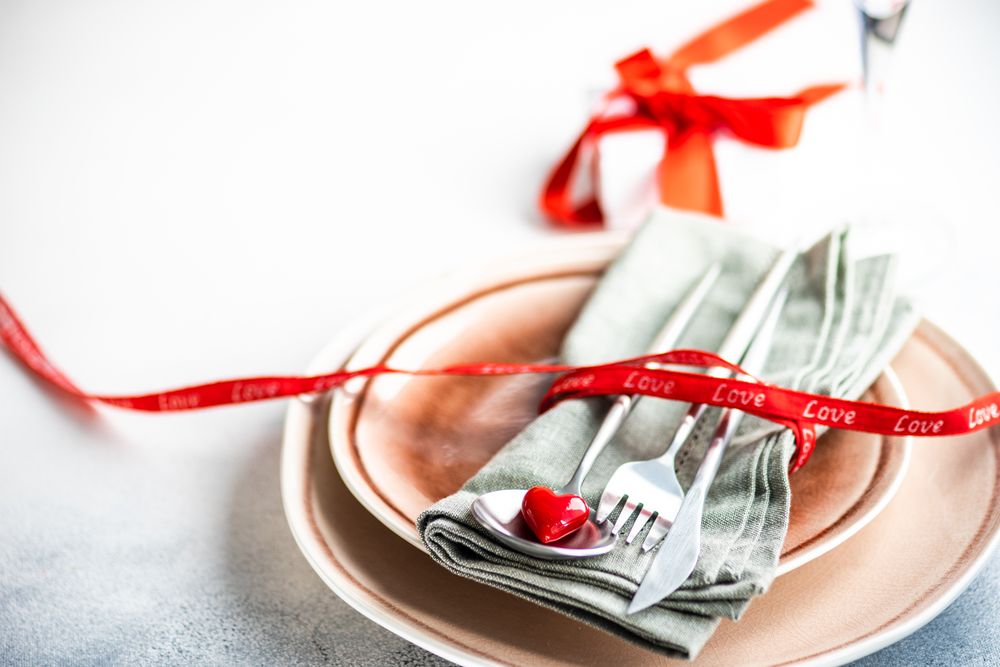 Valentine's Day themed table setting with heart and gift