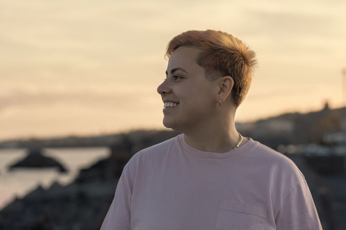Happy Non-Binary Woman with Short Hair