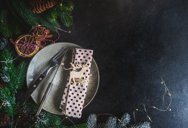 Christmas card concept with table setting with polka dot napkin