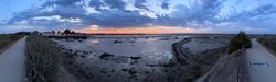 Panoramic of wreck and walkway before the Port de Loix, France