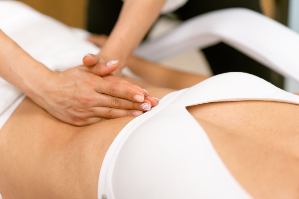 Female’s torso getting a lymphatic massage