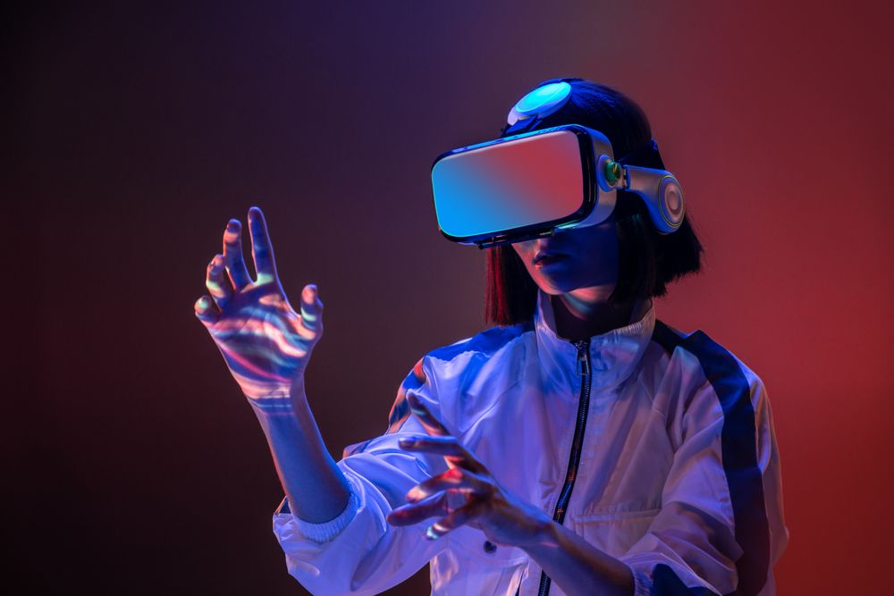 Woman touching air in VR glasses