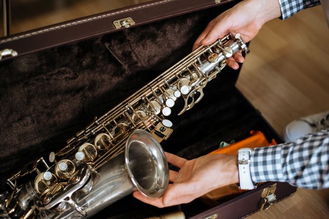 Man holding saxophone