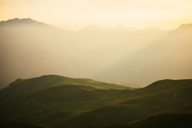 Majestic mountains range in clouds