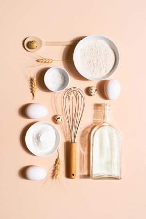 Overhead view of neatly arranged raw baking accessories