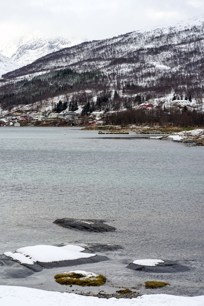 Amazing nordic seascape with mountains and village