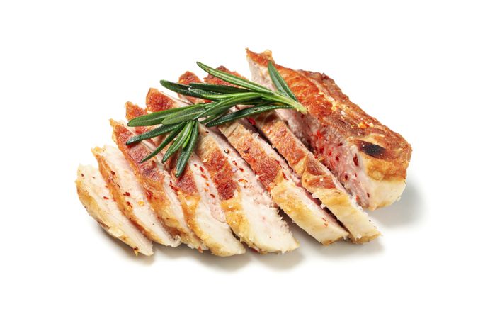 Chopped pork steak isolated on blank background. Grilled food
