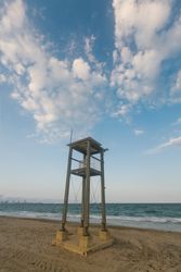 Observation tower at empty seashore