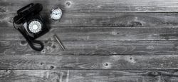Vintage office items on old wooden desk