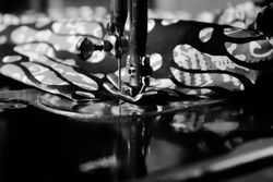 Close up of Indonesian batik fabric under sewing machine needle