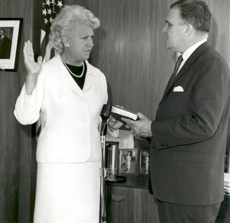 Jacqueline Cochran being sworn in as a consultant by NASA administrator James E. Webb