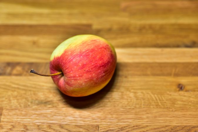 Apple on a wooden table