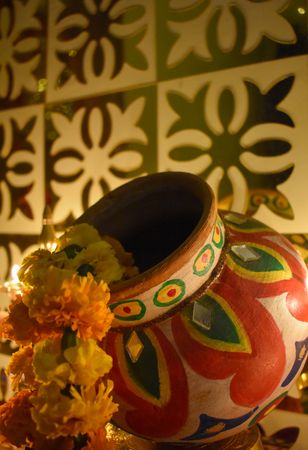 Saffron flowers in a colorful pottery