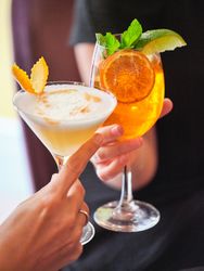 Cheers of colorful tropical cocktails