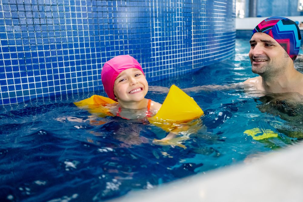 People swimming in pool