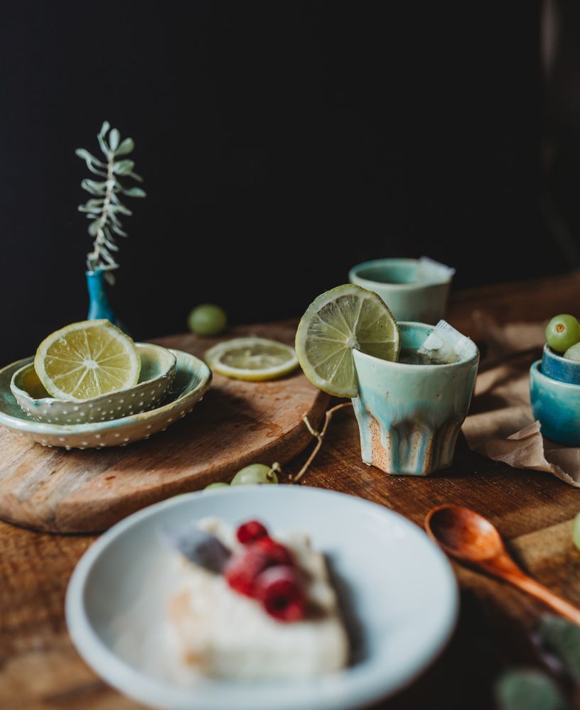 Arrangement of ceramic utensil on wood table