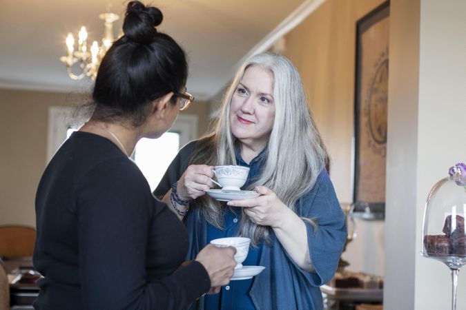 Women having a conversation over tea