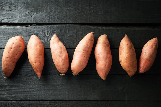 Concept of vegetables, sweet potato, top view