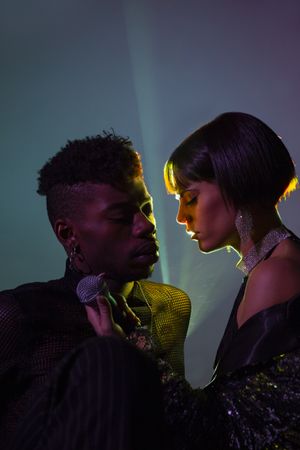 Traces of light on faces of couple