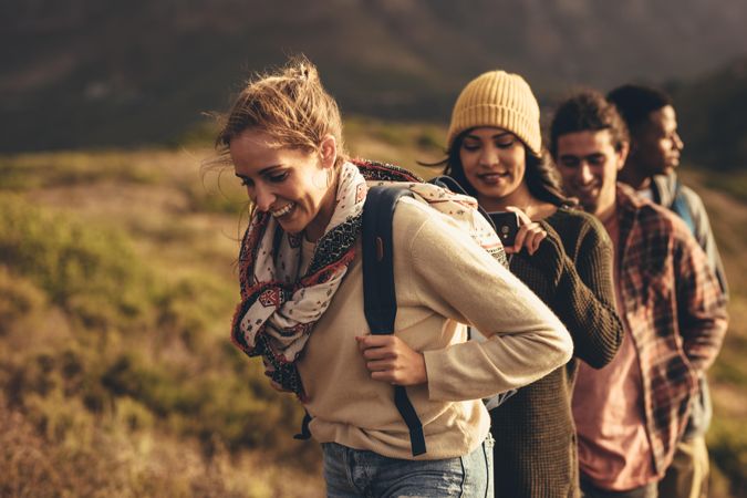 Group of friends on hiking trip to create content for social media