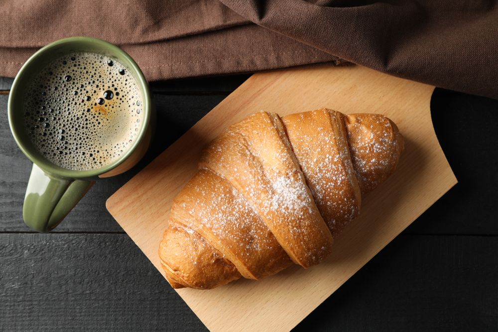 Top view of pastry with coffee